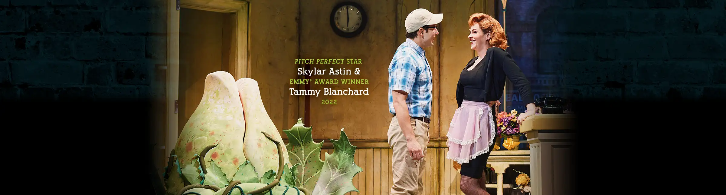 Skylar Astin and Emmy Award winner Tammy Blanchard performing in the 2022 Broadway revival of Little Shop of Horrors at the Westside Theatre, with Audrey II on stage.