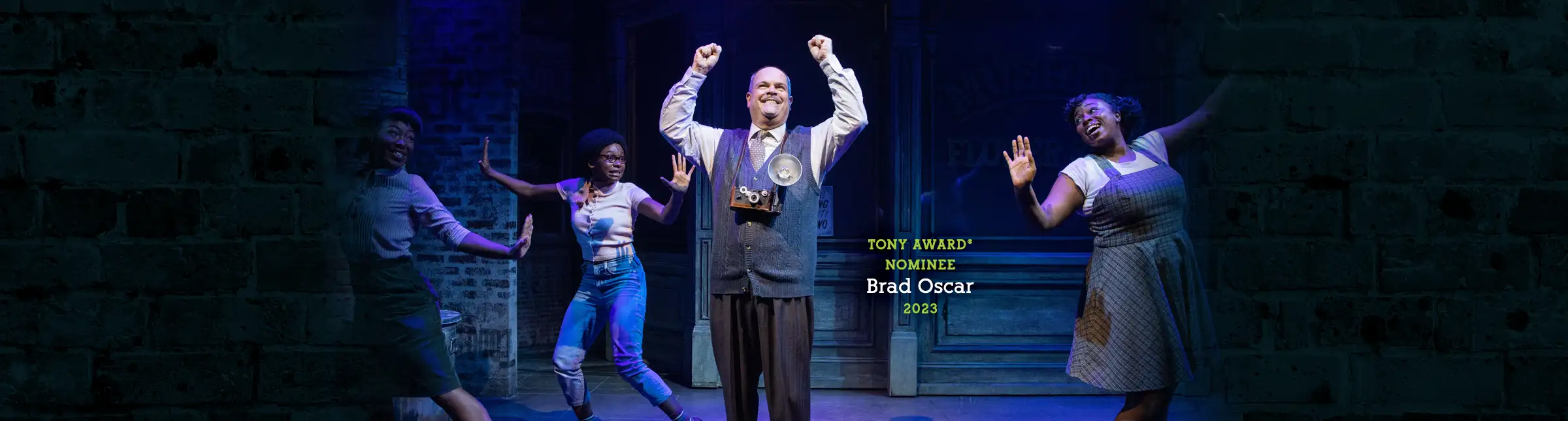 Tony Award nominee Brad Oscar performing in the 2023 Broadway production of Little Shop of Horrors, joined by the ensemble in a lively musical number at the Westside Theatre.