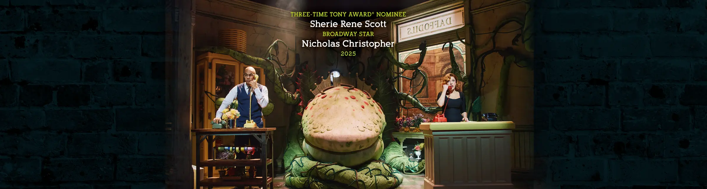 Sherie Rene Scott and Nicholas Christopher in the 2025 Broadway cast of Little Shop of Horrors, performing with the iconic Audrey II plant.